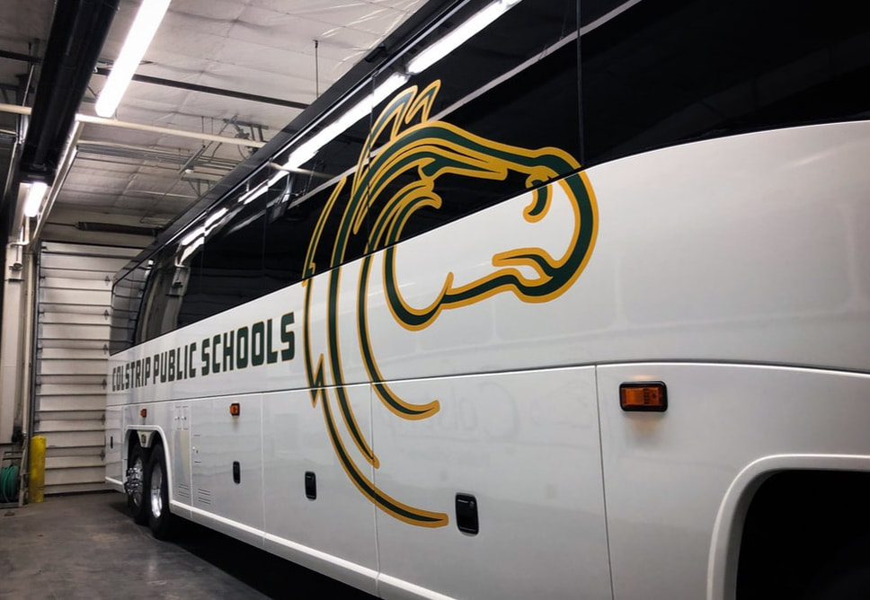 FM Creations Partial Vehicle Wrap - Colstrip High School Team Charter Bus in Southeastern Montana